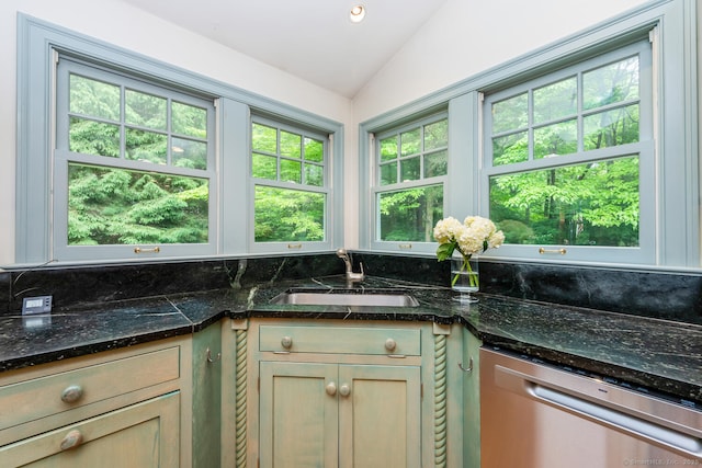 66 Saunders Dr, Wilton, CT 06897 - kitchen with dishwasher, vaulted ceiling, and dark stone countertops