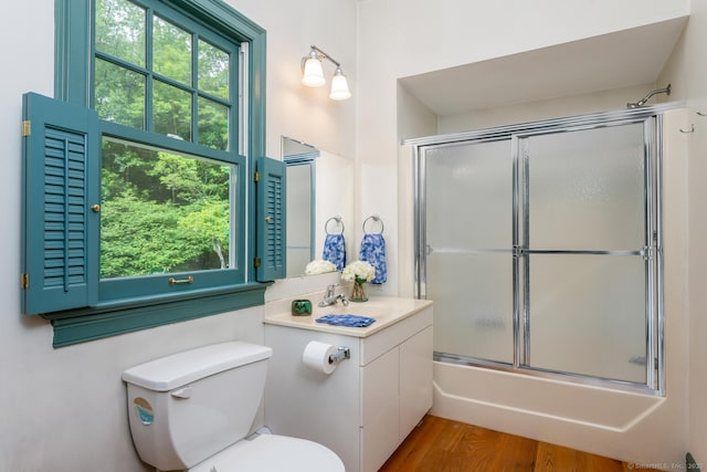 66 Saunders Dr, Wilton, CT 06897 - full bathroom with combined bath / shower with glass door and wood finished floors