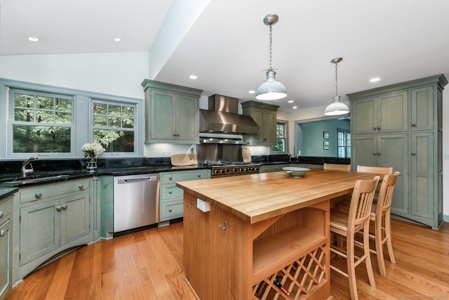 66 Saunders Dr, Wilton, CT 06897 - kitchen featuring dishwasher, wall chimney exhaust hood, wood counters, light wood-type flooring, and recessed lighting