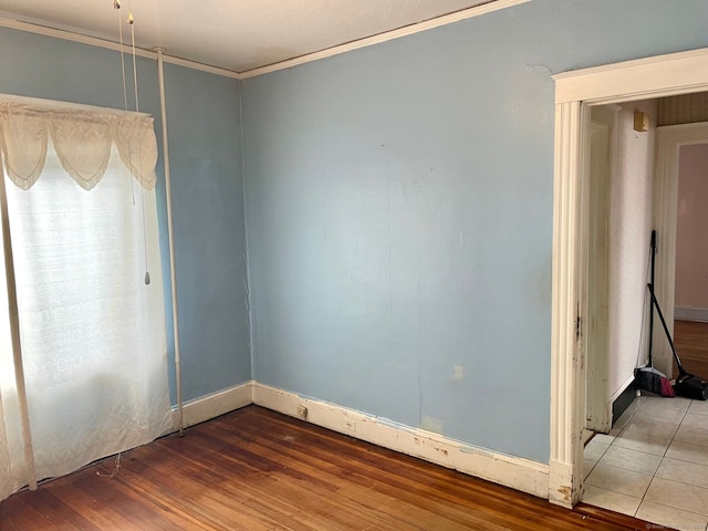 190 Holcomb St, Hartford, CT 06112 - empty room featuring hardwood / wood-style flooring, baseboards, and crown molding