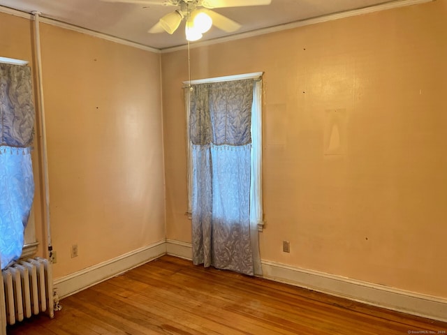 190 Holcomb St, Hartford, CT 06112 - unfurnished room featuring radiator, wood finished floors, a ceiling fan, ornamental molding, and baseboards