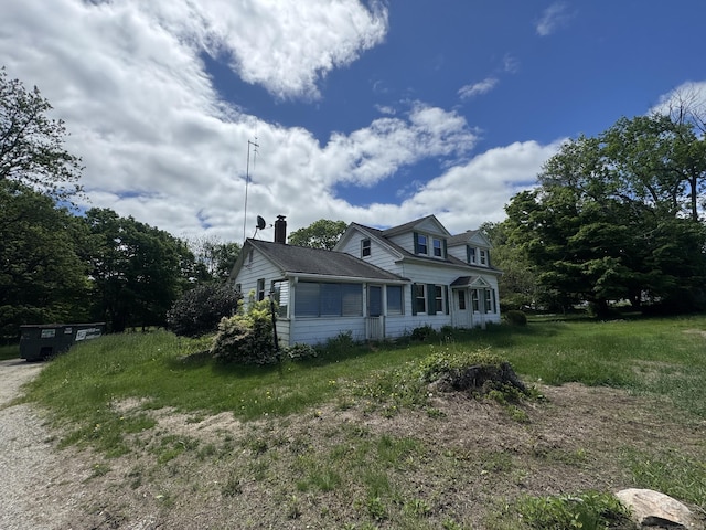 602 Pomfret St, Putnam, CT 06260 - view of side of home with a chimney