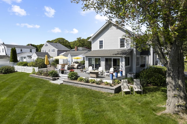 15 Attawan Ave, East Lyme, CT 06357 - rear view of property featuring a patio area and a residential view