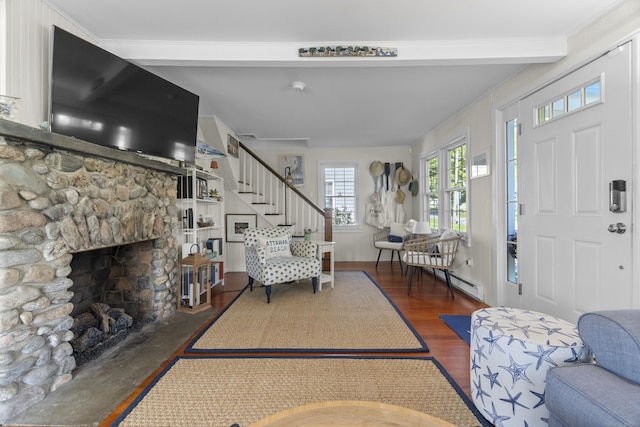 15 Attawan Ave, East Lyme, CT 06357 - entryway featuring stairs, wood finished floors, a stone fireplace, a baseboard radiator, and beamed ceiling