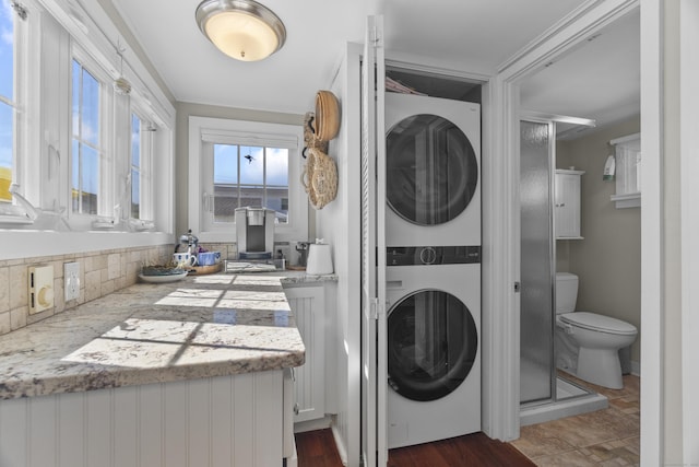 15 Attawan Ave, East Lyme, CT 06357 - laundry room featuring stacked washing machine and dryer