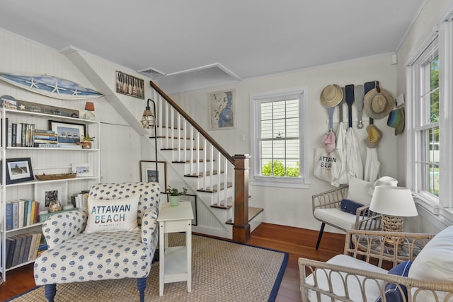 15 Attawan Ave, East Lyme, CT 06357 - sitting room featuring ornamental molding, healthy amount of natural light, wood finished floors, and stairway