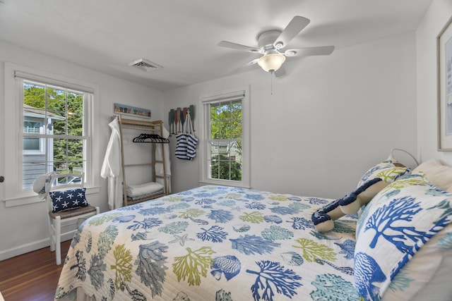 15 Attawan Ave, East Lyme, CT 06357 - bedroom featuring wood finished floors, multiple windows, baseboards, and a ceiling fan