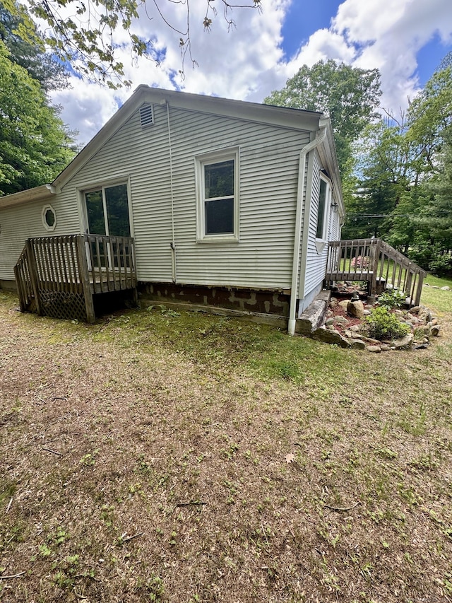 616 Crystal Lake Rd, Tolland, CT 06084 - rear view of property with a wooden deck