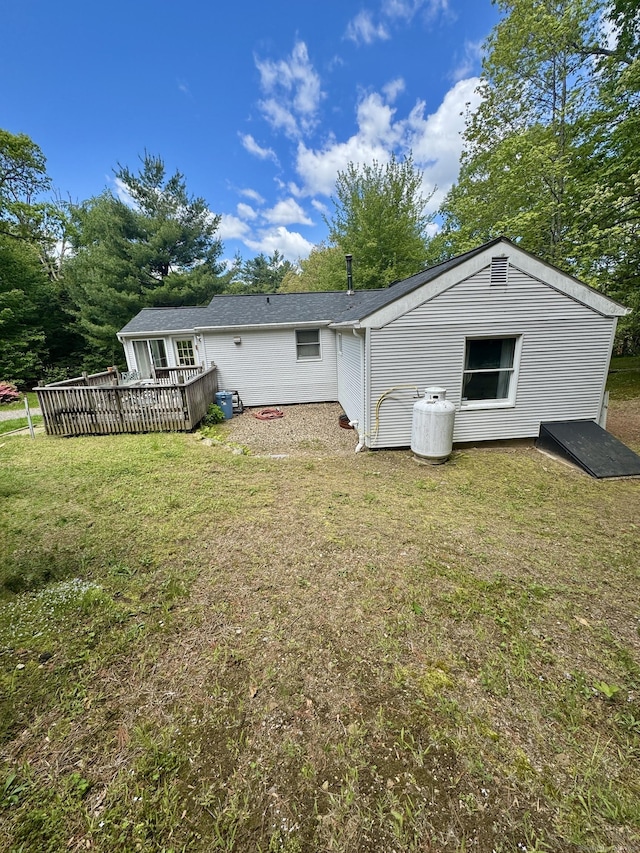 616 Crystal Lake Rd, Tolland, CT 06084 - rear view of house featuring a deck and a yard