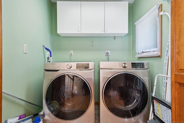 10 Colonial Dr, Clinton, CT 06413 - laundry area with washing machine and dryer and cabinet space