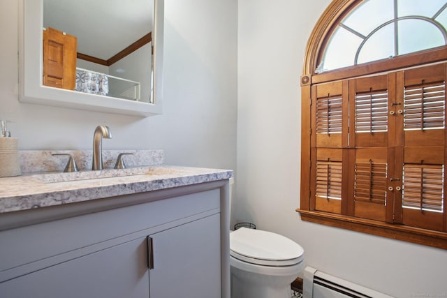 10 Colonial Dr, Clinton, CT 06413 - bathroom featuring toilet, vanity, and a baseboard heating unit