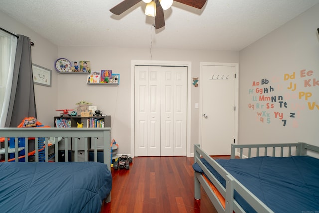 56 Buena Vista Dr, East Hartford, CT 06118 - bedroom featuring dark wood-style flooring, a closet, and ceiling fan