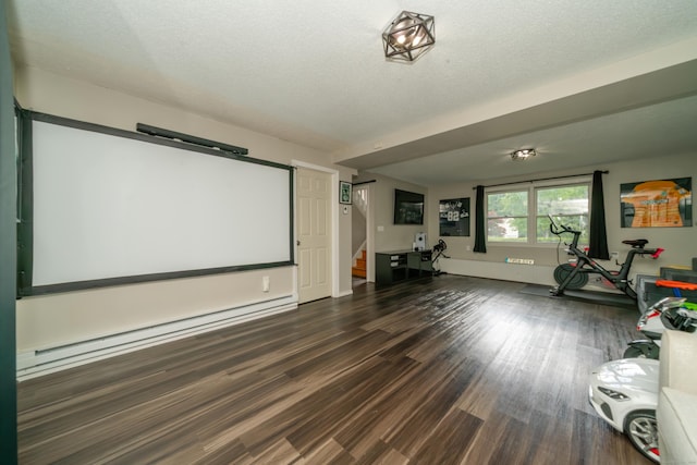 56 Buena Vista Dr, East Hartford, CT 06118 - cinema featuring a baseboard radiator and dark wood-style floors