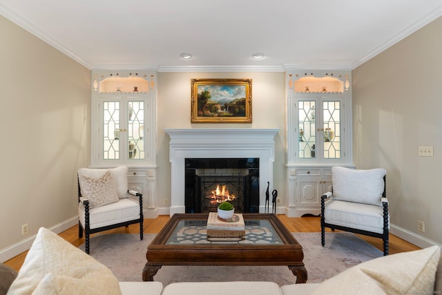 14 Fernhurst, Farmington, CT 06032 - living area featuring ornamental molding, a lit fireplace, wood finished floors, baseboards, and recessed lighting
