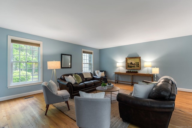 14 Fernhurst, Farmington, CT 06032 - living area featuring baseboards and wood finished floors