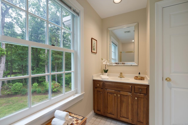 14 Fernhurst, Farmington, CT 06032 - bathroom featuring vanity, tile patterned floors, and baseboards