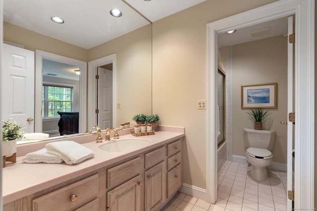 14 Fernhurst, Farmington, CT 06032 - bathroom featuring vanity, toilet, tile patterned flooring, bath / shower combo with glass door, and baseboards