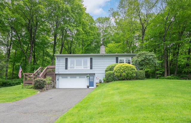5 Old Bethel Rd, Newtown, CT 06470 - view of front of property featuring driveway, an attached garage, a chimney, a front yard, and view of wooded area