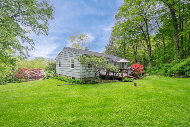 5 Old Bethel Rd, Newtown, CT 06470 - rear view of house featuring a wooden deck, a chimney, and a yard