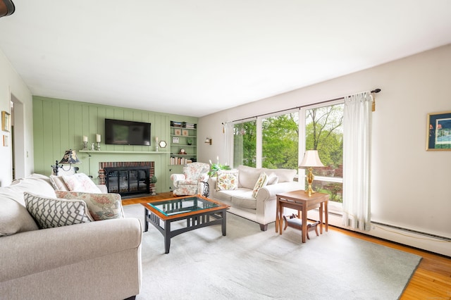 5 Old Bethel Rd, Newtown, CT 06470 - living area featuring a brick fireplace and light wood-type flooring