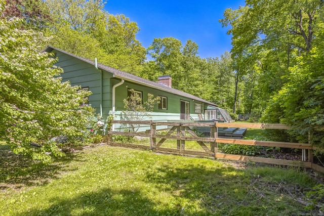 200 Willow St, Hamden, CT 06518 - view of home's exterior featuring a chimney