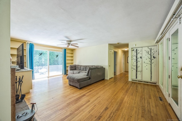 200 Willow St, Hamden, CT 06518 - living area featuring wood-type flooring, ceiling fan, and a textured ceiling
