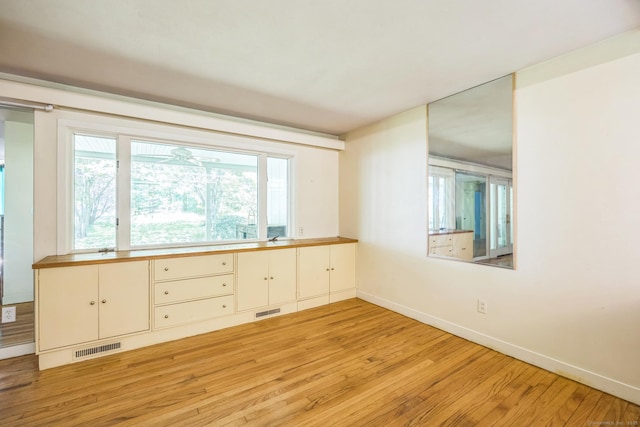 200 Willow St, Hamden, CT 06518 - unfurnished room featuring light wood-style flooring, plenty of natural light, and baseboards