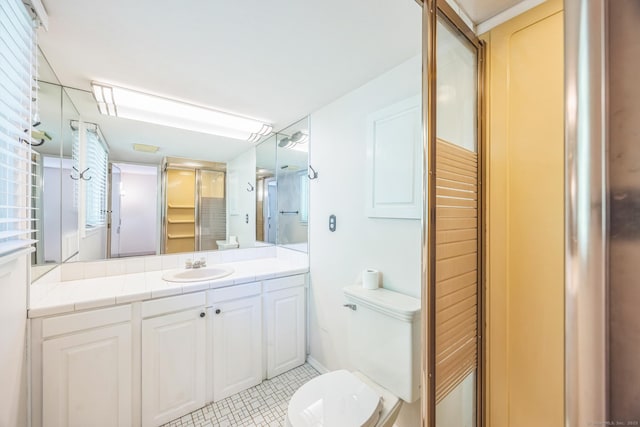 200 Willow St, Hamden, CT 06518 - full bath with toilet, vanity, an enclosed shower, and tile patterned flooring