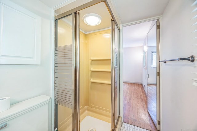 200 Willow St, Hamden, CT 06518 - full bathroom with a shower stall, wood finished floors, and toilet