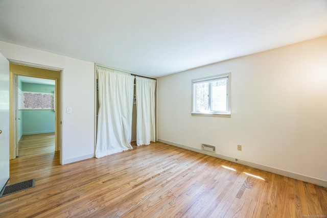 200 Willow St, Hamden, CT 06518 - empty room featuring light wood-style flooring and baseboards