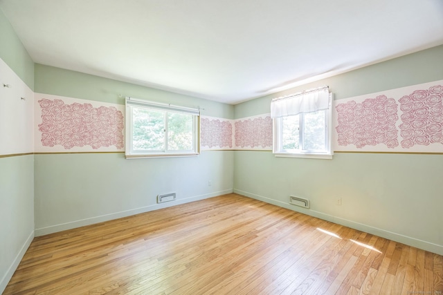 200 Willow St, Hamden, CT 06518 - unfurnished room with wood-type flooring and baseboards