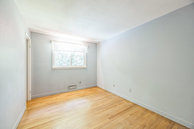 200 Willow St, Hamden, CT 06518 - unfurnished room featuring wood finished floors and baseboards