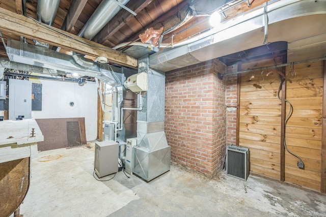 200 Willow St, Hamden, CT 06518 - unfinished basement featuring electric panel and wooden walls