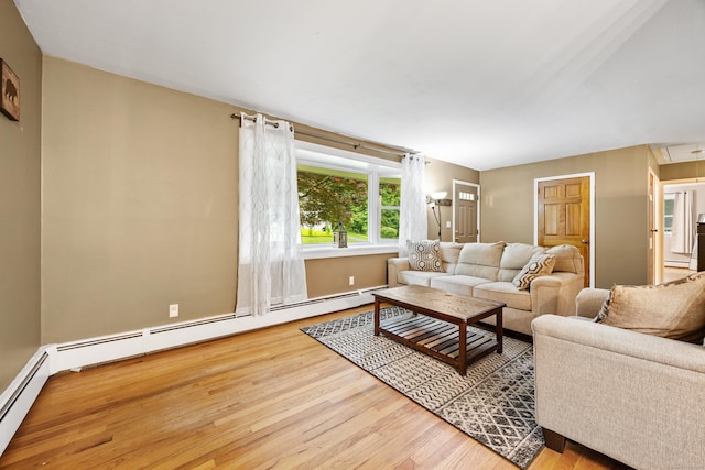 55 Andrasko Rd, Beacon Falls, CT 06403 - living room with wood finished floors, attic access, a baseboard heating unit, and baseboards