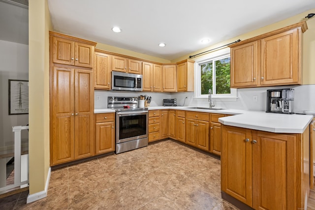 55 Andrasko Rd, Beacon Falls, CT 06403 - kitchen with appliances with stainless steel finishes, a sink, recessed lighting, and light countertops