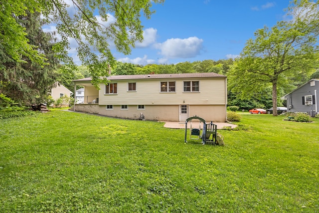 55 Andrasko Rd, Beacon Falls, CT 06403 - rear view of property with a yard