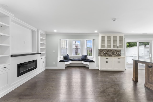 864 Baldwin St, Waterbury, CT 06706 - living room featuring ornamental molding, healthy amount of natural light, dark wood-style floors, recessed lighting, and baseboards