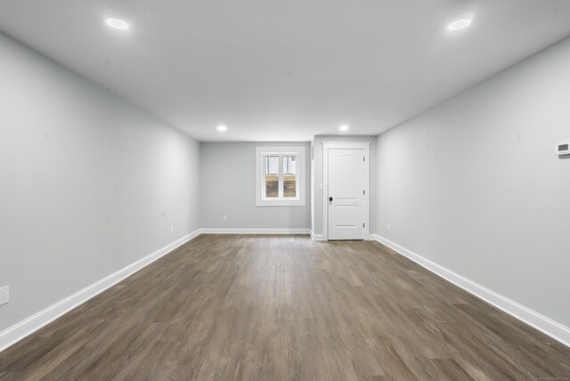 864 Baldwin St, Waterbury, CT 06706 - spare room with dark wood-type flooring, recessed lighting, and baseboards