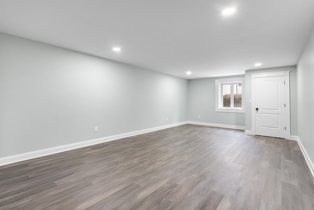864 Baldwin St, Waterbury, CT 06706 - unfurnished room with dark wood-style flooring, recessed lighting, and baseboards