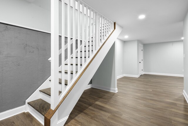 864 Baldwin St, Waterbury, CT 06706 - stairs featuring recessed lighting, wood finished floors, and baseboards