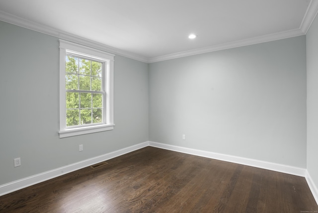 864 Baldwin St, Waterbury, CT 06706 - unfurnished room featuring baseboards, dark wood-style flooring, ornamental molding, and recessed lighting