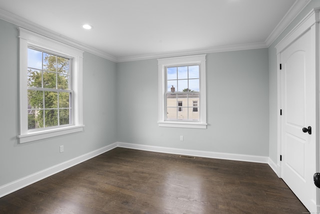 864 Baldwin St, Waterbury, CT 06706 - empty room featuring crown molding, baseboards, dark wood-style flooring, and recessed lighting