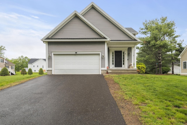 50 Silver Island Way Unit 50, Berlin, CT 06037 - view of front facade with driveway, a front lawn, and an attached garage