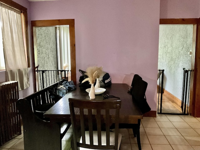 148 Burwell Rd, West Haven, CT 06516 - dining area with radiator and light tile patterned floors