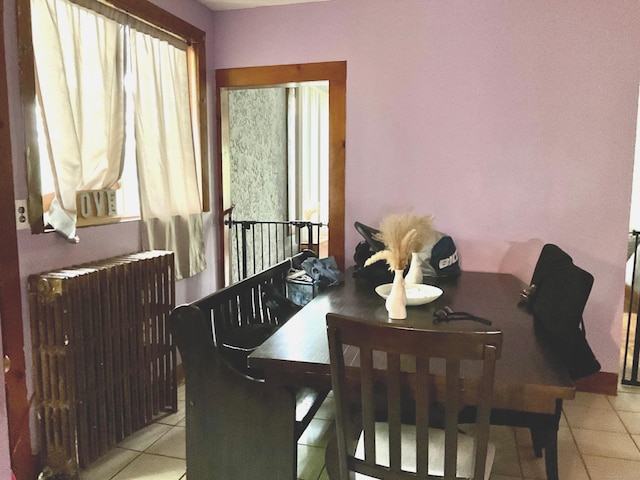 148 Burwell Rd, West Haven, CT 06516 - dining room featuring radiator and tile patterned floors