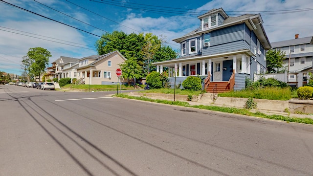 174 Fairview Ave, Bridgeport, CT 06606 - american foursquare style home with a porch and a residential view