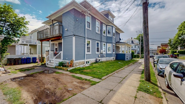 174 Fairview Ave, Bridgeport, CT 06606 - view of side of home with a balcony