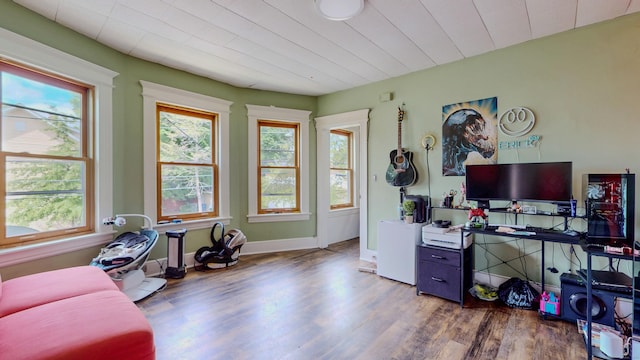 174 Fairview Ave, Bridgeport, CT 06606 - living room featuring healthy amount of natural light, wood finished floors, and baseboards
