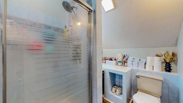 174 Fairview Ave, Bridgeport, CT 06606 - bathroom with a stall shower, toilet, and tile walls