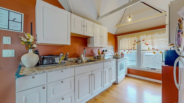 174 Fairview Ave, Bridgeport, CT 06606 - kitchen with electric range, a sink, light wood-style flooring, and white cabinets